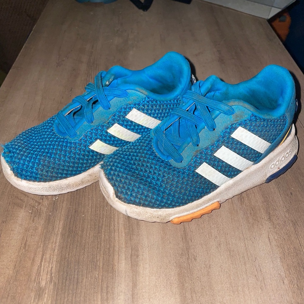 Adorable Adidas shoes.   Size - 7 in kids